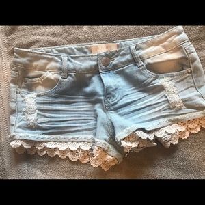 Jean shorts with lace trim